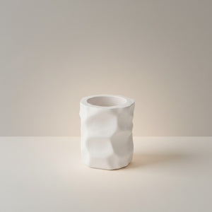 Cave Vessel Jar by Lunarie featuring an organic sculptural texture and matte finish, ideal as a decorative storage vessel for makeup brushes and home décor.