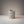 Cave Vessel Jar by Lunarie featuring an organic sculptural texture and matte finish, ideal as a decorative storage vessel for makeup brushes and home décor.