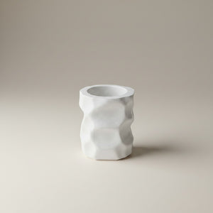 Cave Vessel Jar by Lunarie featuring an organic sculptural texture and matte finish, ideal as a decorative storage vessel for makeup brushes and home décor.