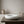 Halo Dish by Lunarie featuring a minimalist rounded design and matte finish, ideal as a jewelry catchall dish and decorative home accent. halo concrete dish on a wooden table with a neutral background