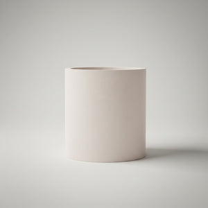 Moon Hollow Tumbler Jar by Lunarie featuring a minimalist cylindrical design with lid, ideal as a decorative storage jar for jewelry and home essentials. Beige concrete jar on a light gray background