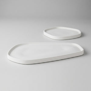 Moon Layers Duo by Lunarie featuring two nesting decorative trays with organic shapes, ideal for jewelry, candles, and modern home décor.