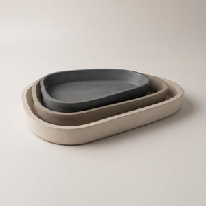 Moon Layers Trio by Lunarie featuring three nesting decorative trays with organic shapes, ideal for jewelry, candles, and modern home décor.