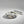 Noir Blanc Vein Marble Trinket Dish by Lunarie made from natural white marble with black veining, Marble-patterned dish  with a pen on a gray background