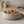 Orbit Bowl by Lunarie featuring a minimalist rounded design and matte finish, ideal as a decorative catchall bowl for jewelry and modern home décor.  filled with walnuts on a kitchen counter