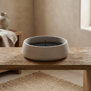 Orbit Bowl by Lunarie featuring a minimalist rounded design and matte finish, ideal as a decorative catchall bowl for jewelry and modern home décor. place on a wooden surface with a neutral background